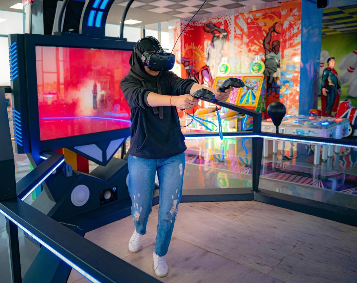 Waves Aqua Resort Kenitra Exterior photo A visitor uses a virtual reality headset at the museum.